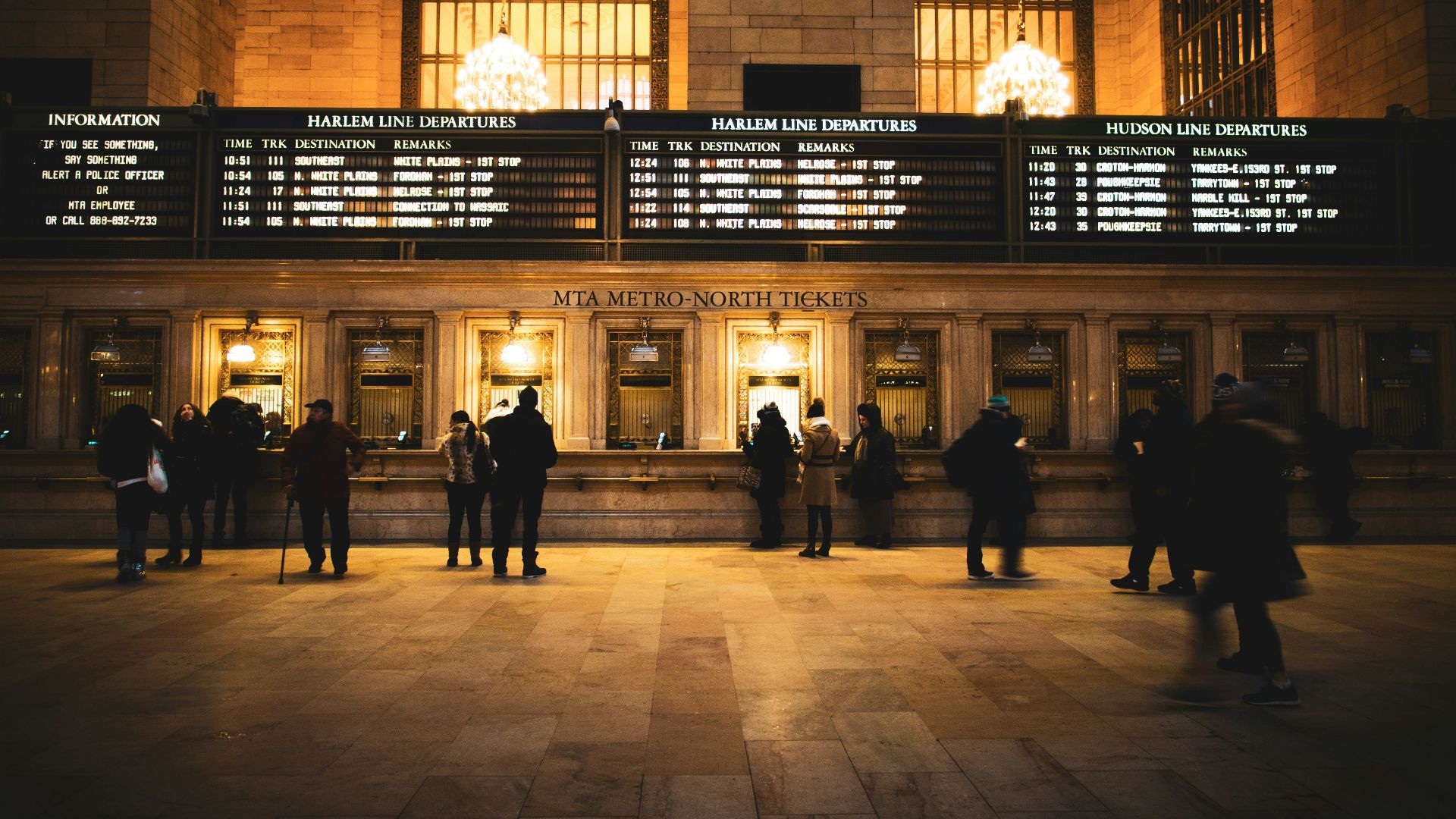 people on MTA Metro North Tickets shop front
