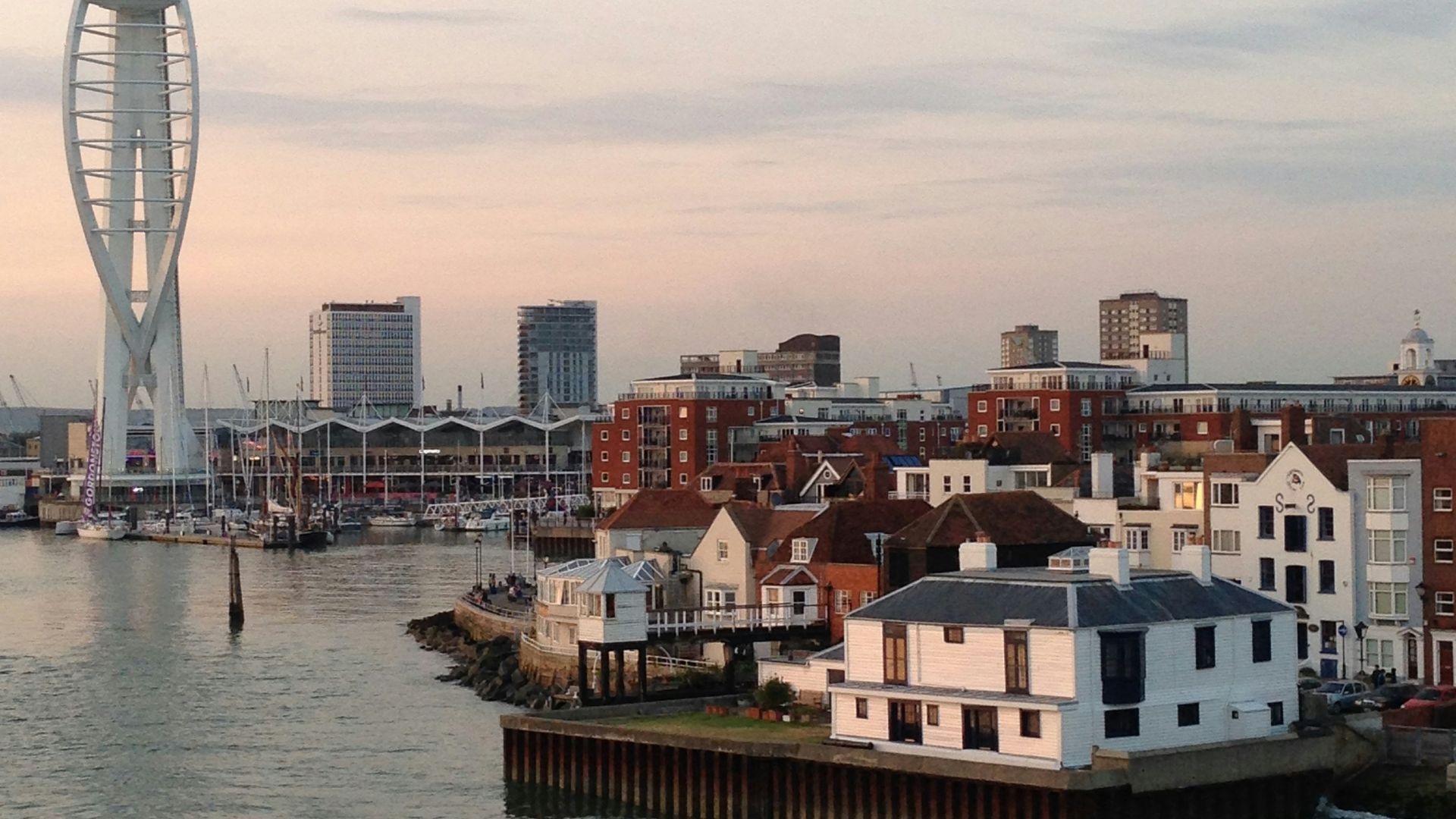 city skyline near body of water during daytime
