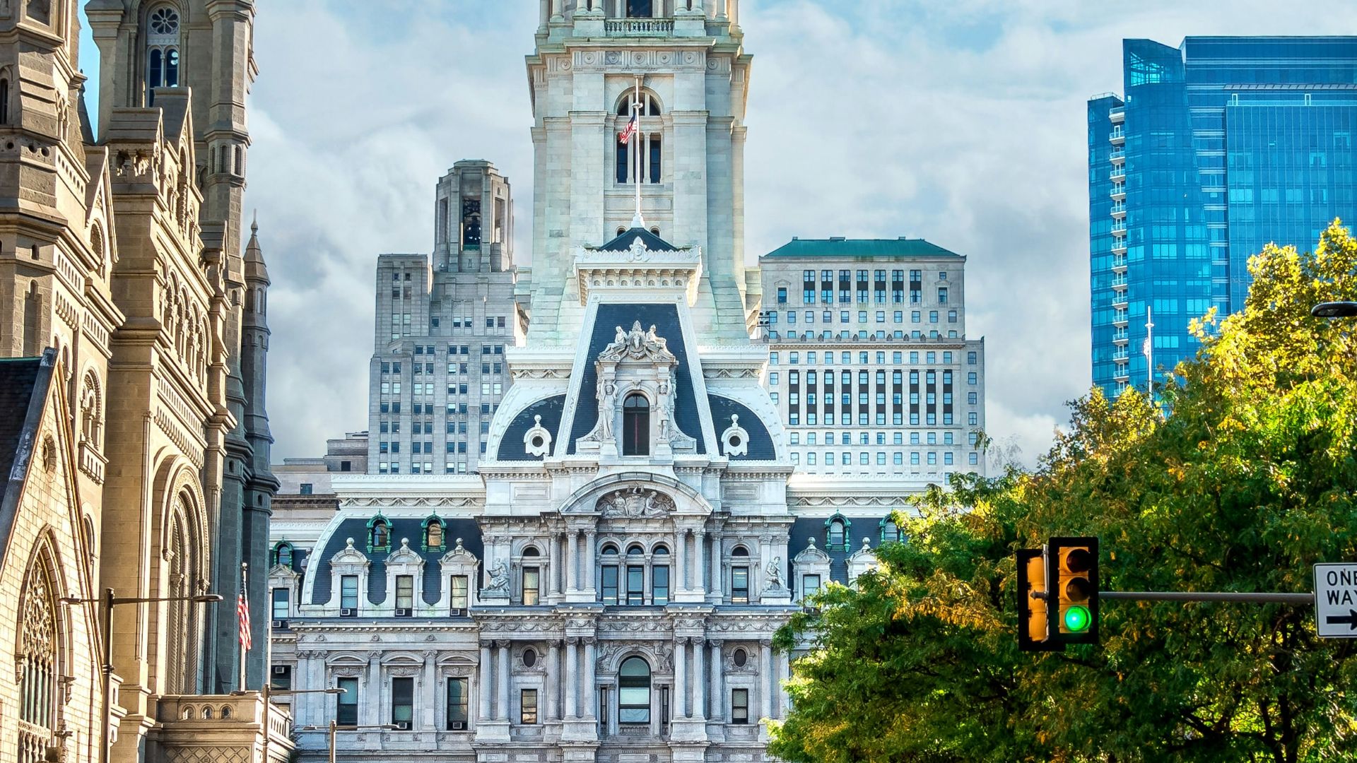 white wall paint building near on towers