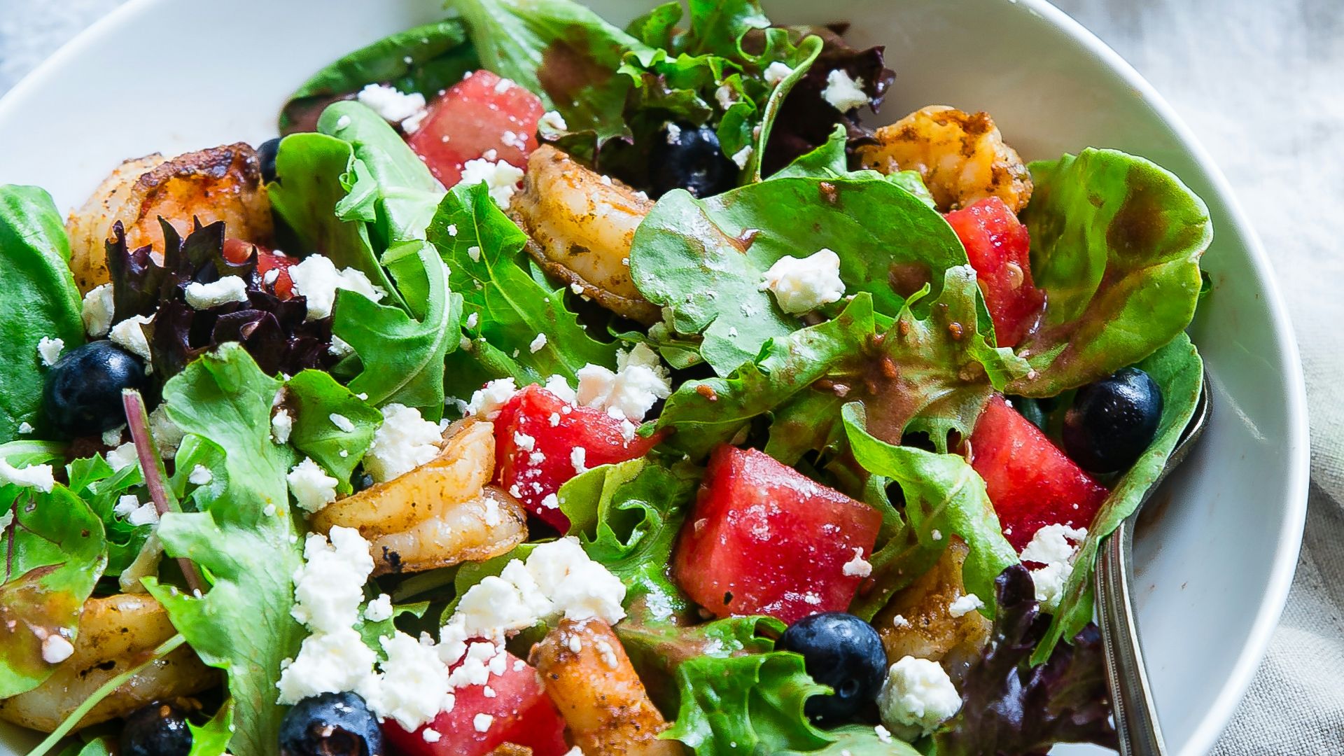 vegetable salad on white ceramic bowl
