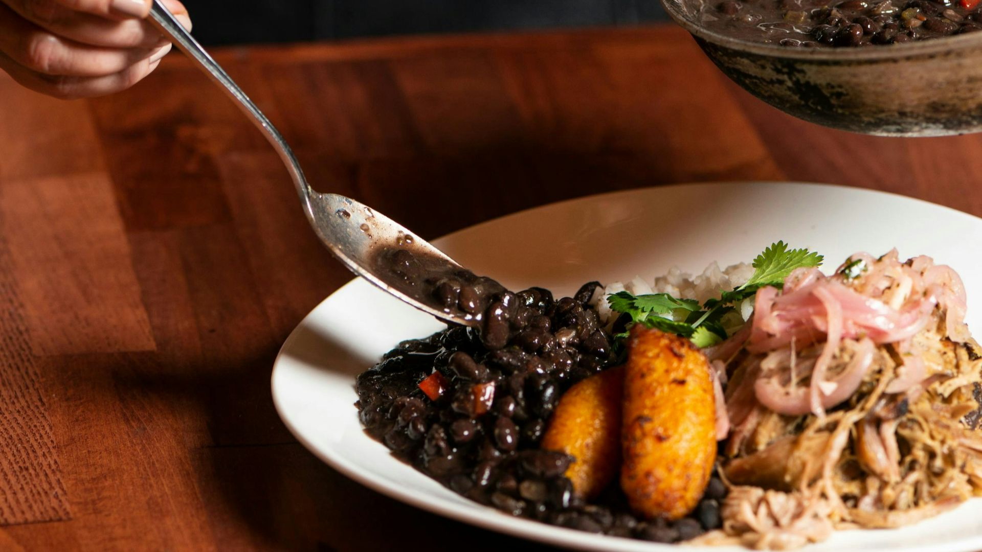 A plate of food on a wooden table