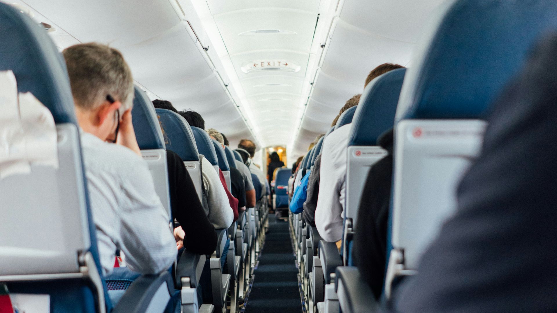 people sitting inside plane
