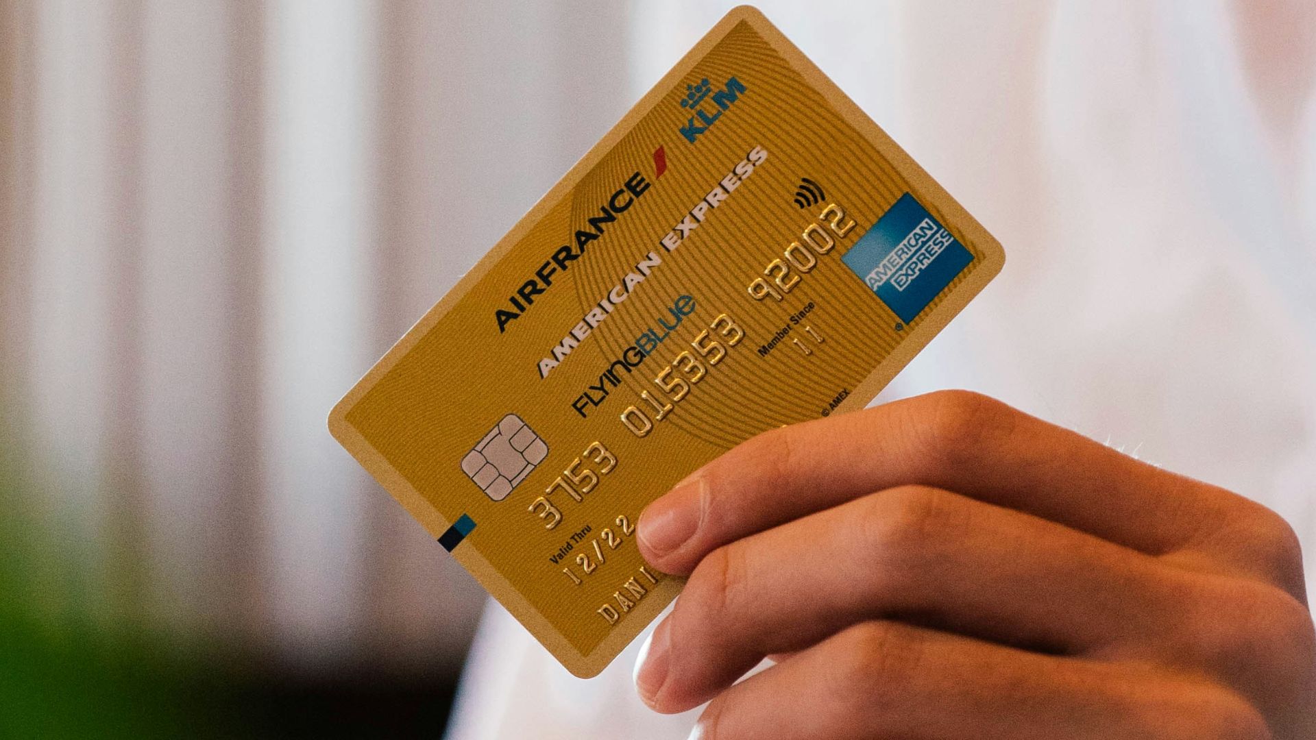 person holding credit card