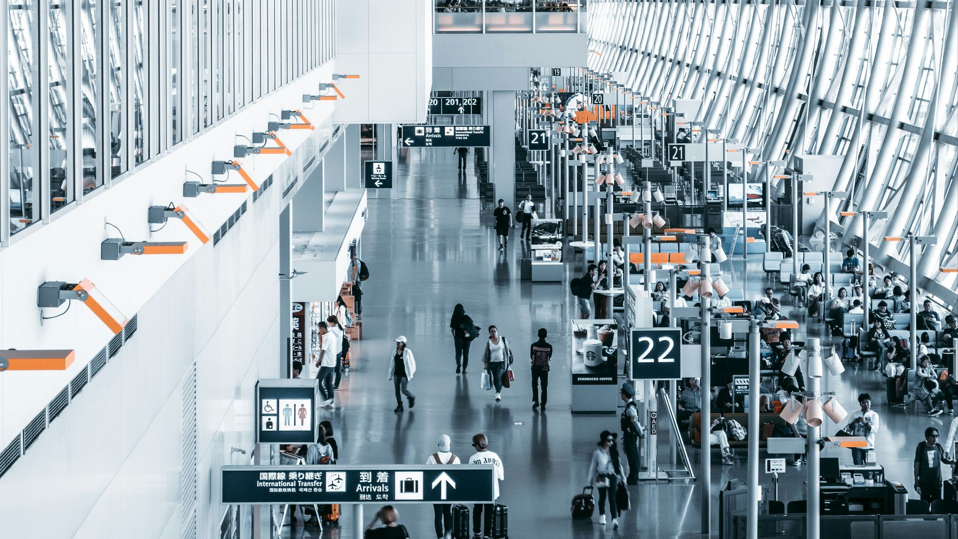 people walking inside airport station