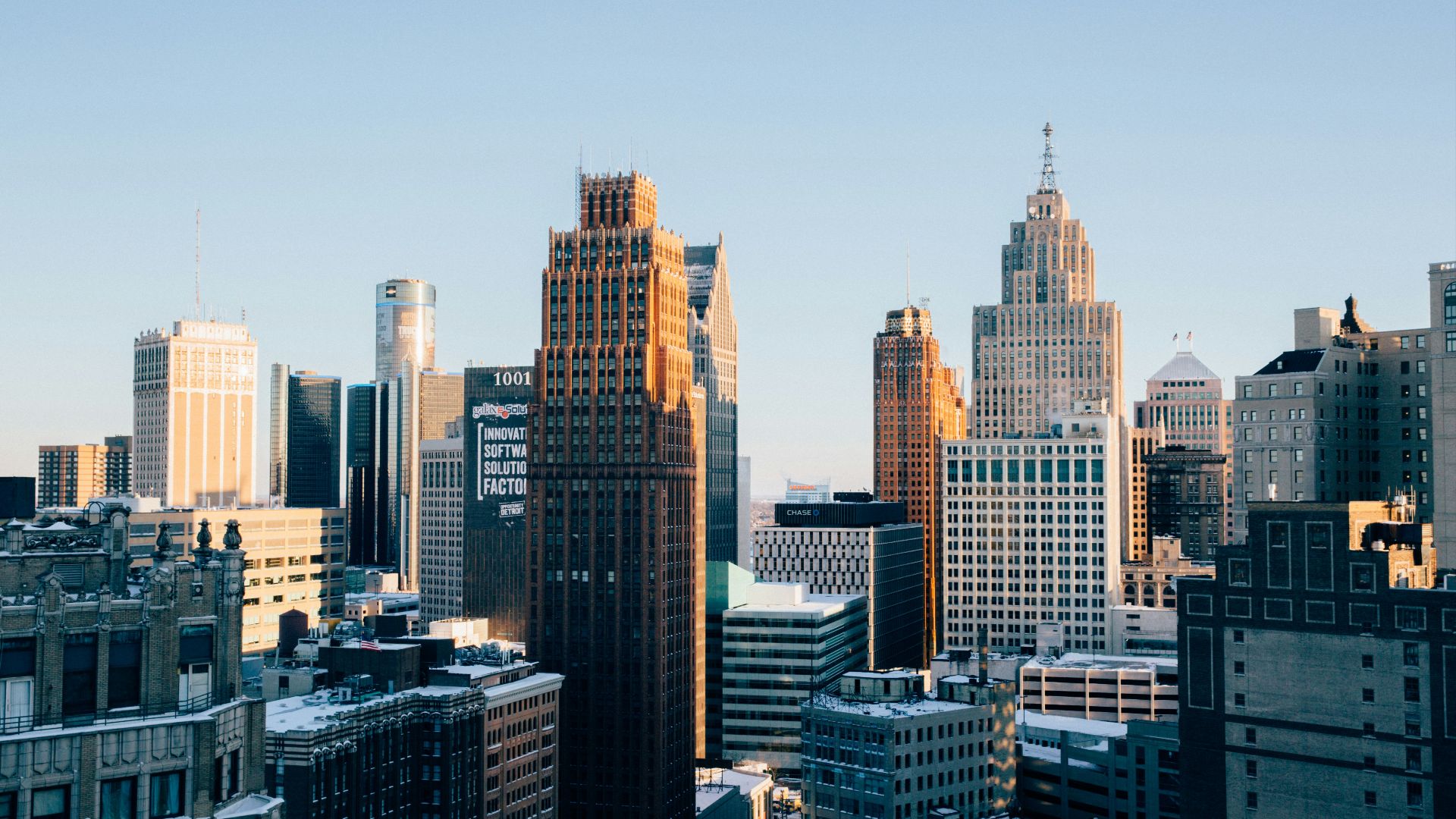 a view of a city with tall buildings