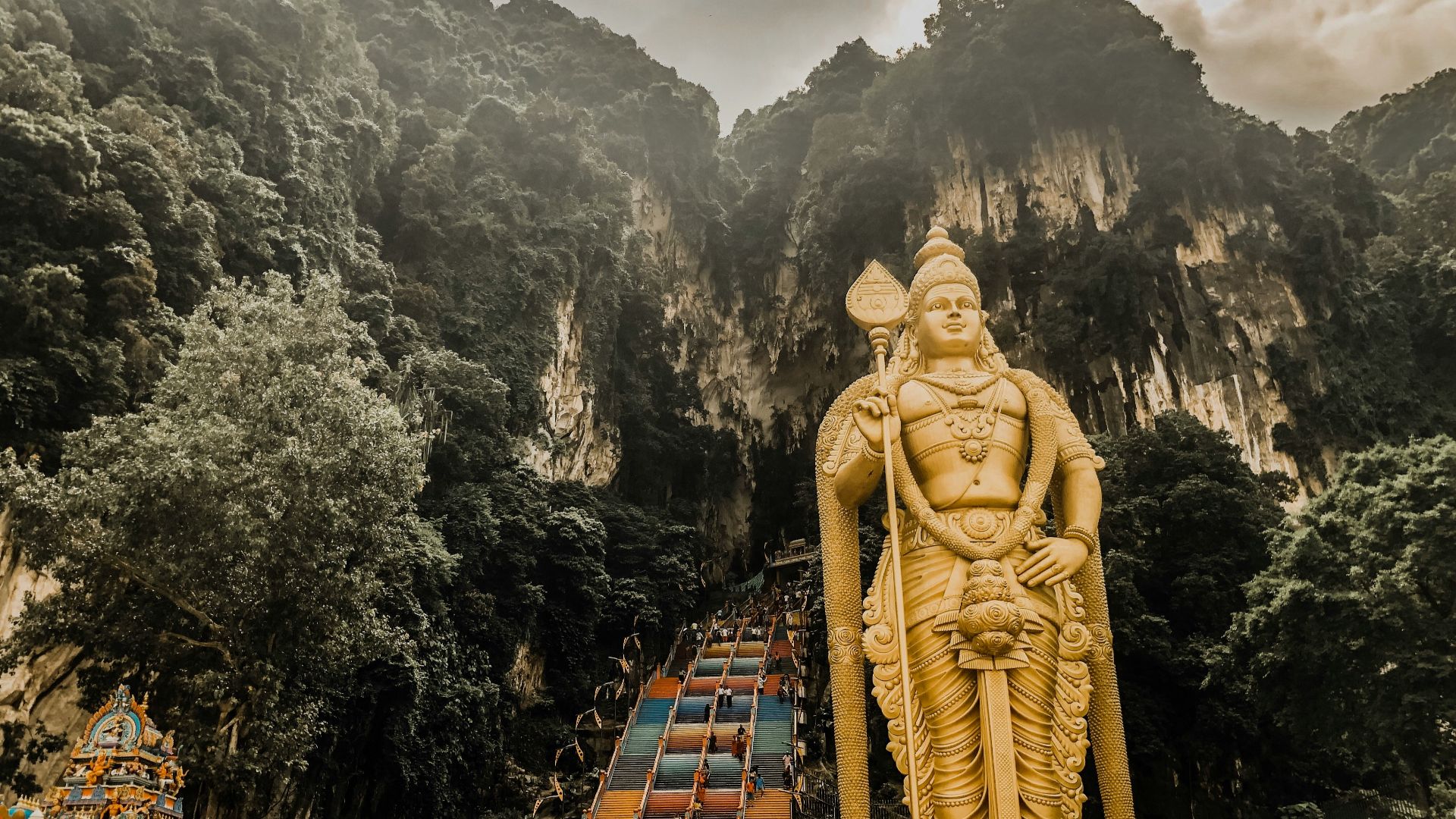 statue near mountain