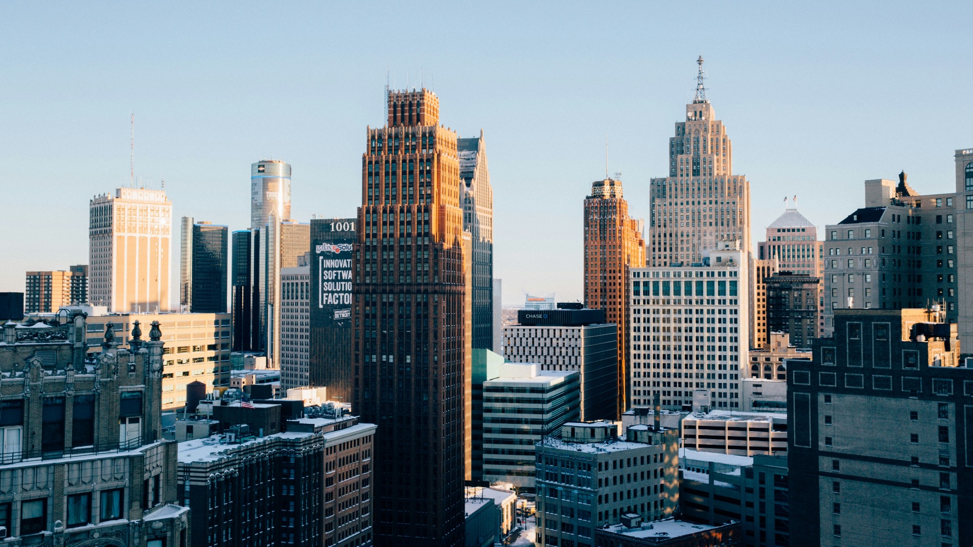 a view of a city with tall buildings