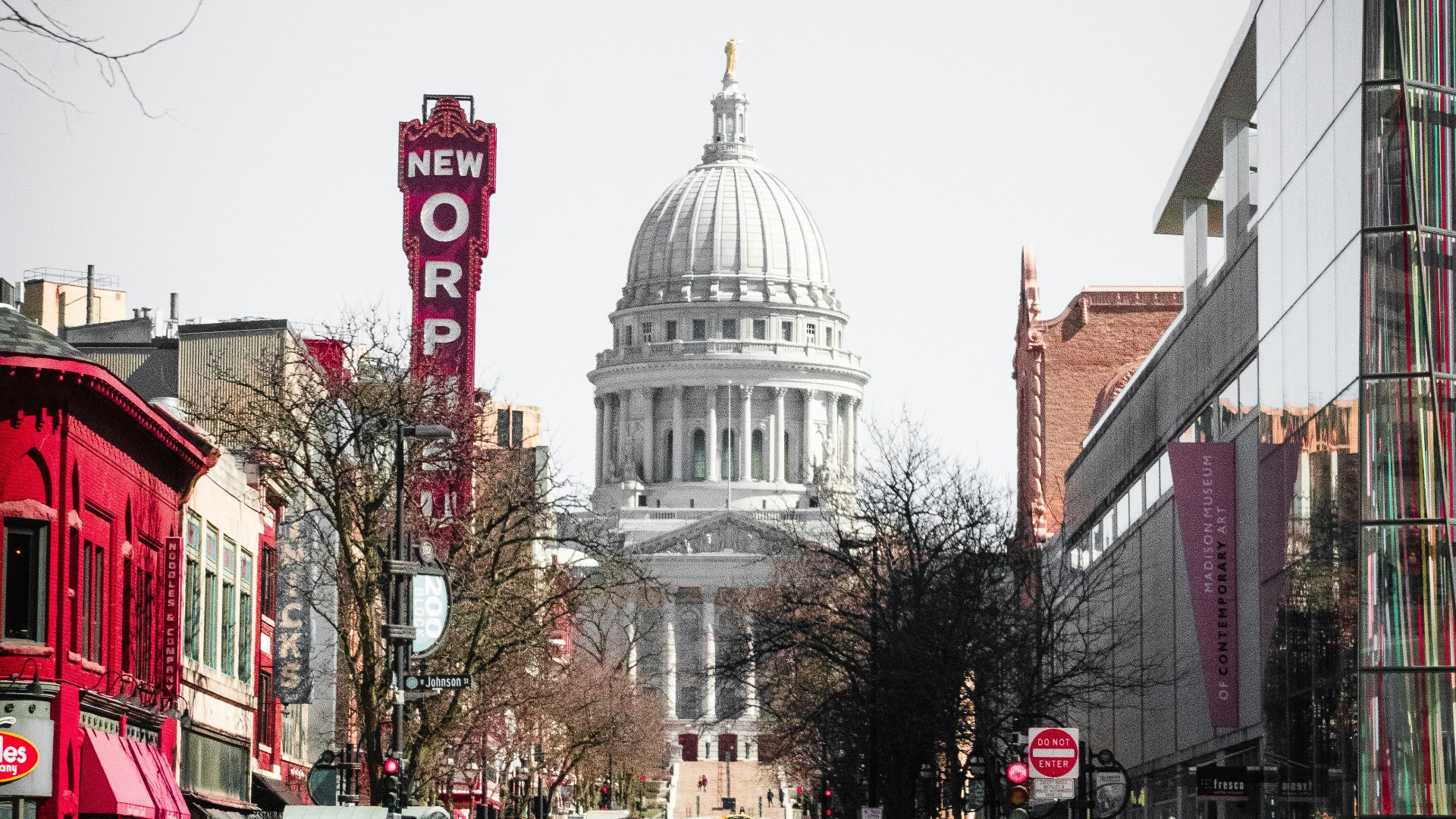 cars parked on street near building during daytime