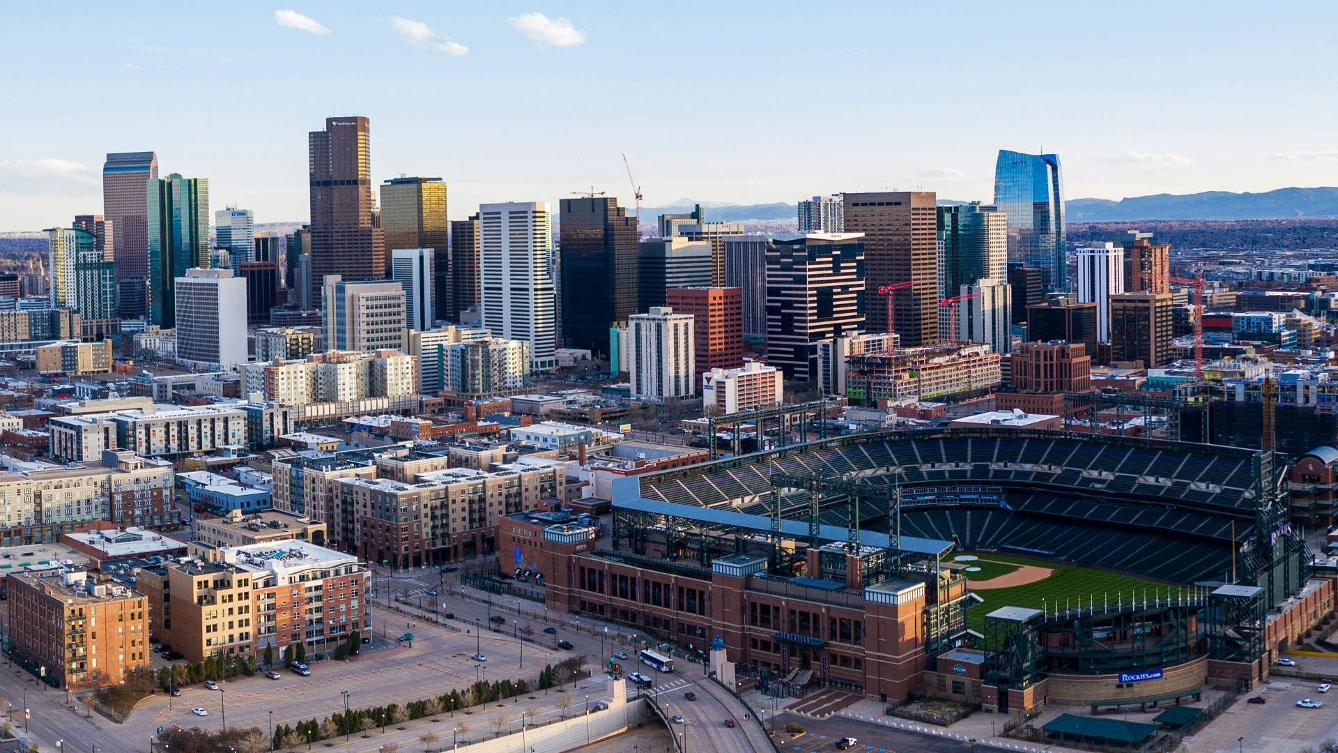 city buildings under blue sky during daytime