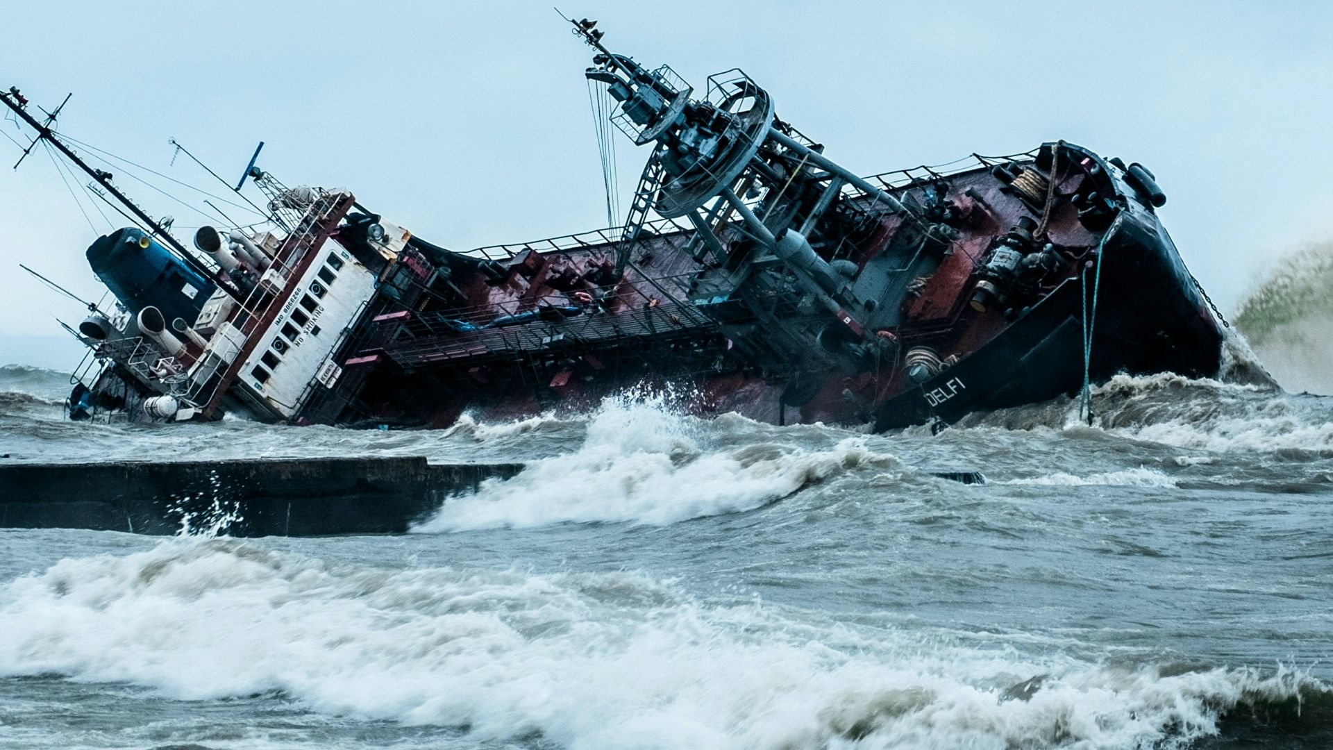 black and brown ship on sea during daytime