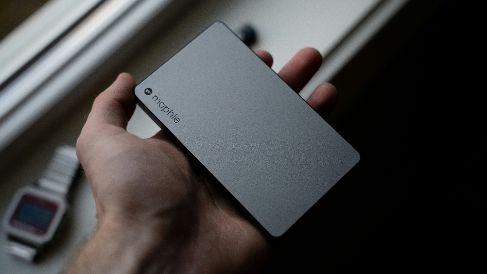 person holding white huawei smartphone