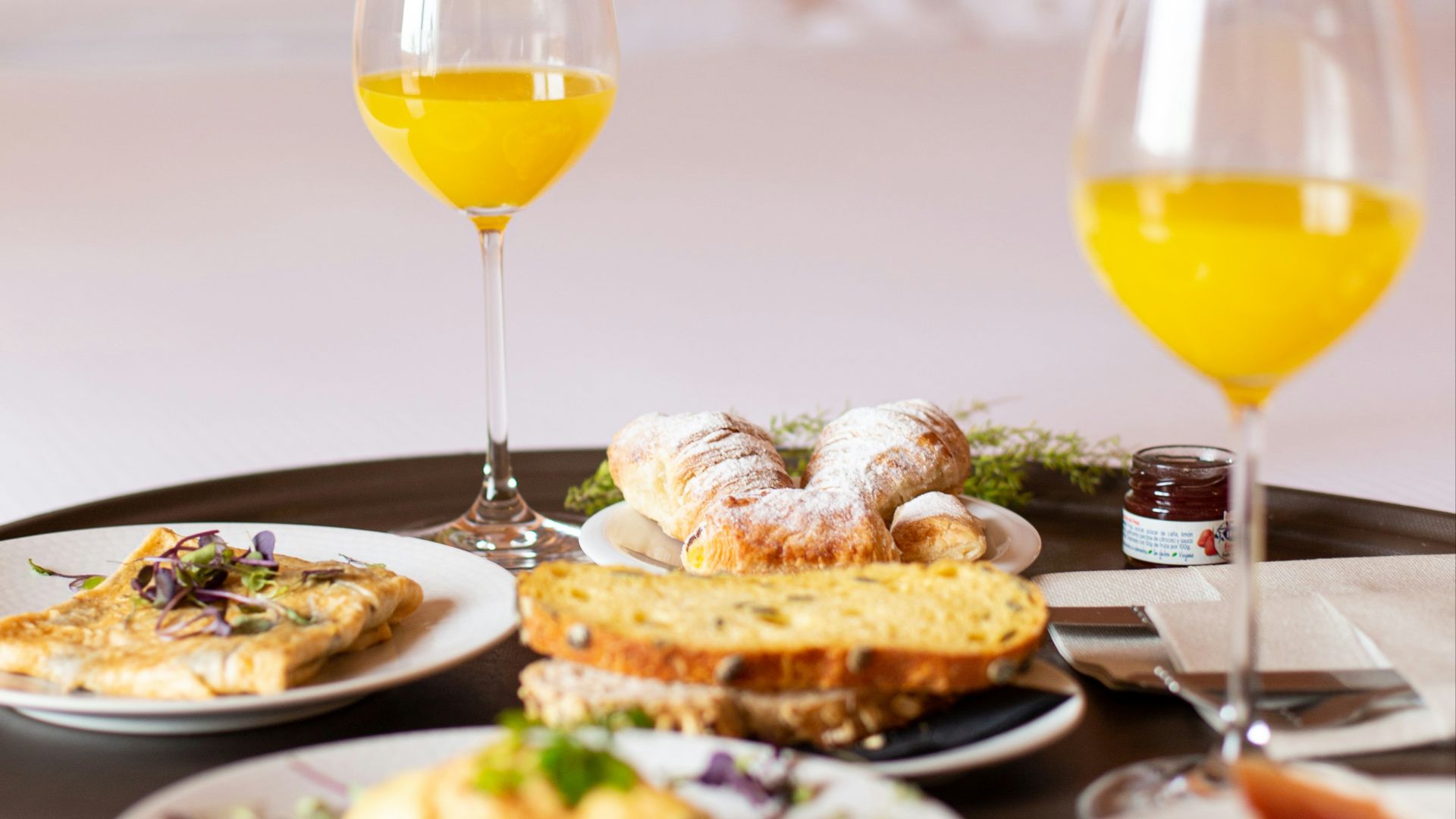 bread with sliced lemon on white ceramic plate