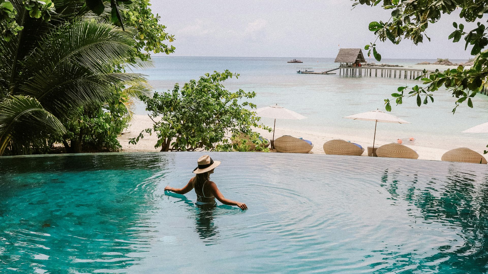 woman on body of water during daytime