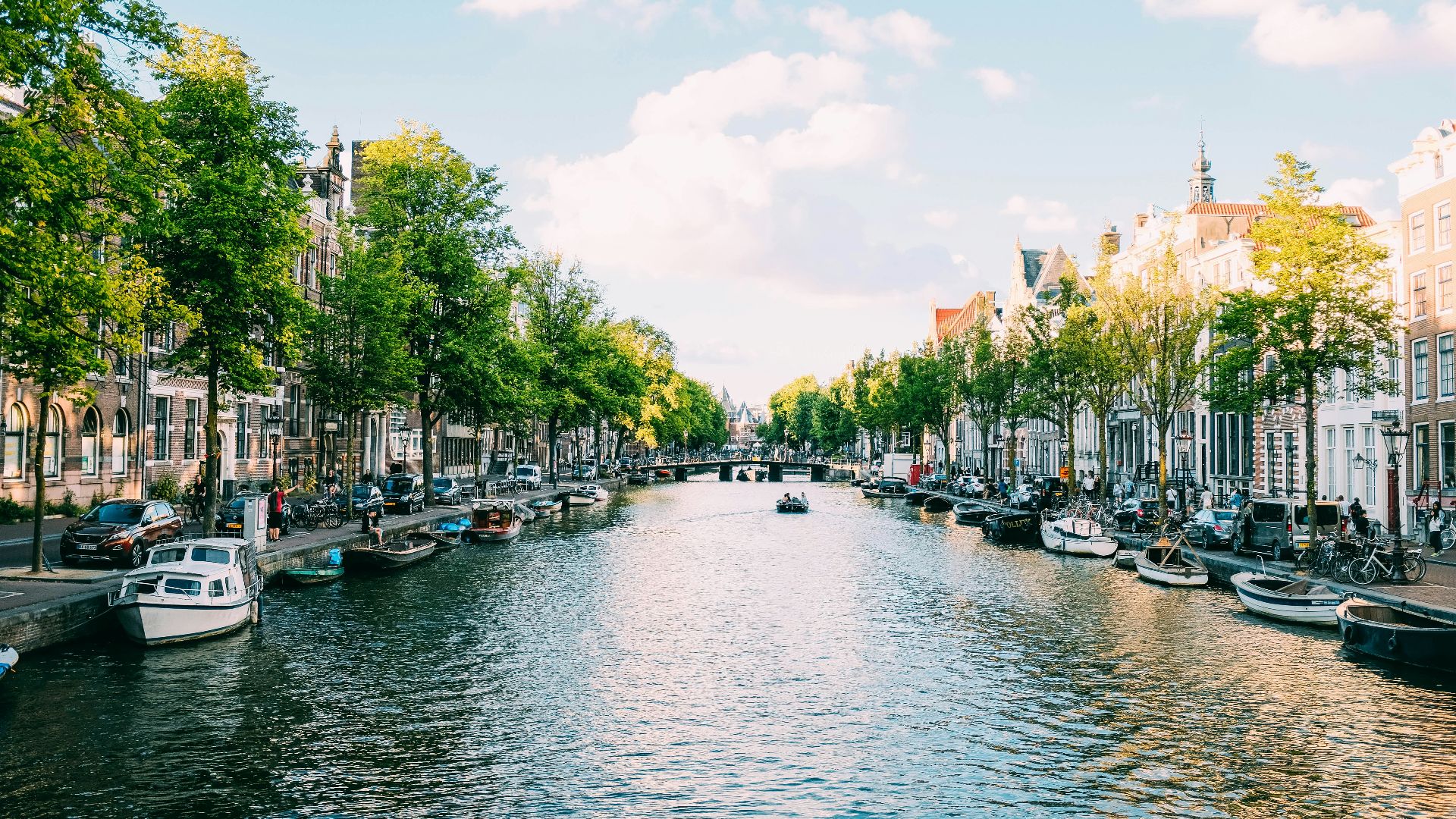 body of water under white sky