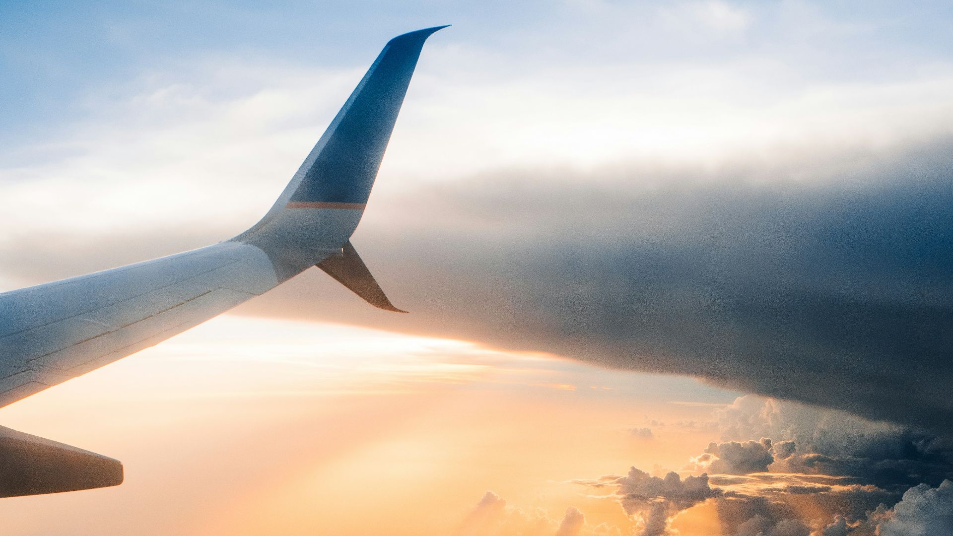 airplane on sky during golden hour