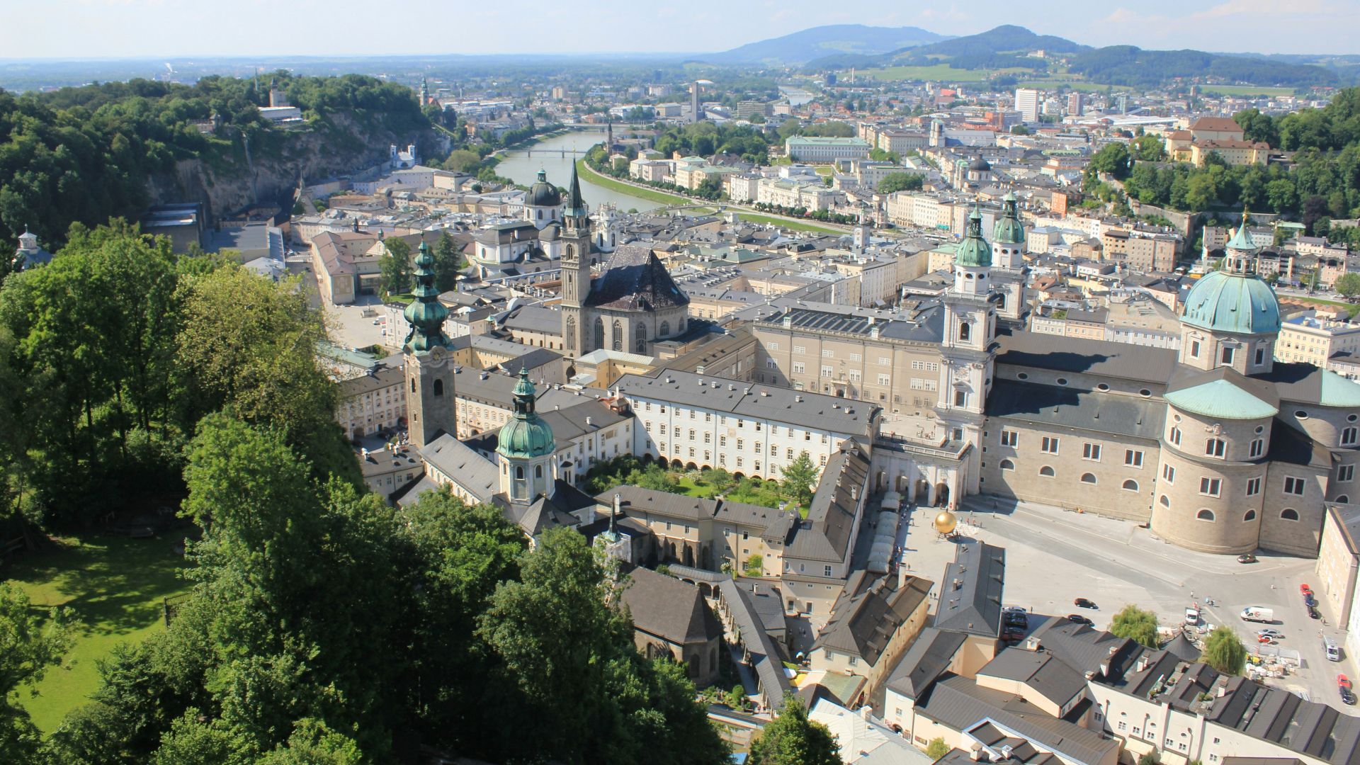a city with many buildings and trees