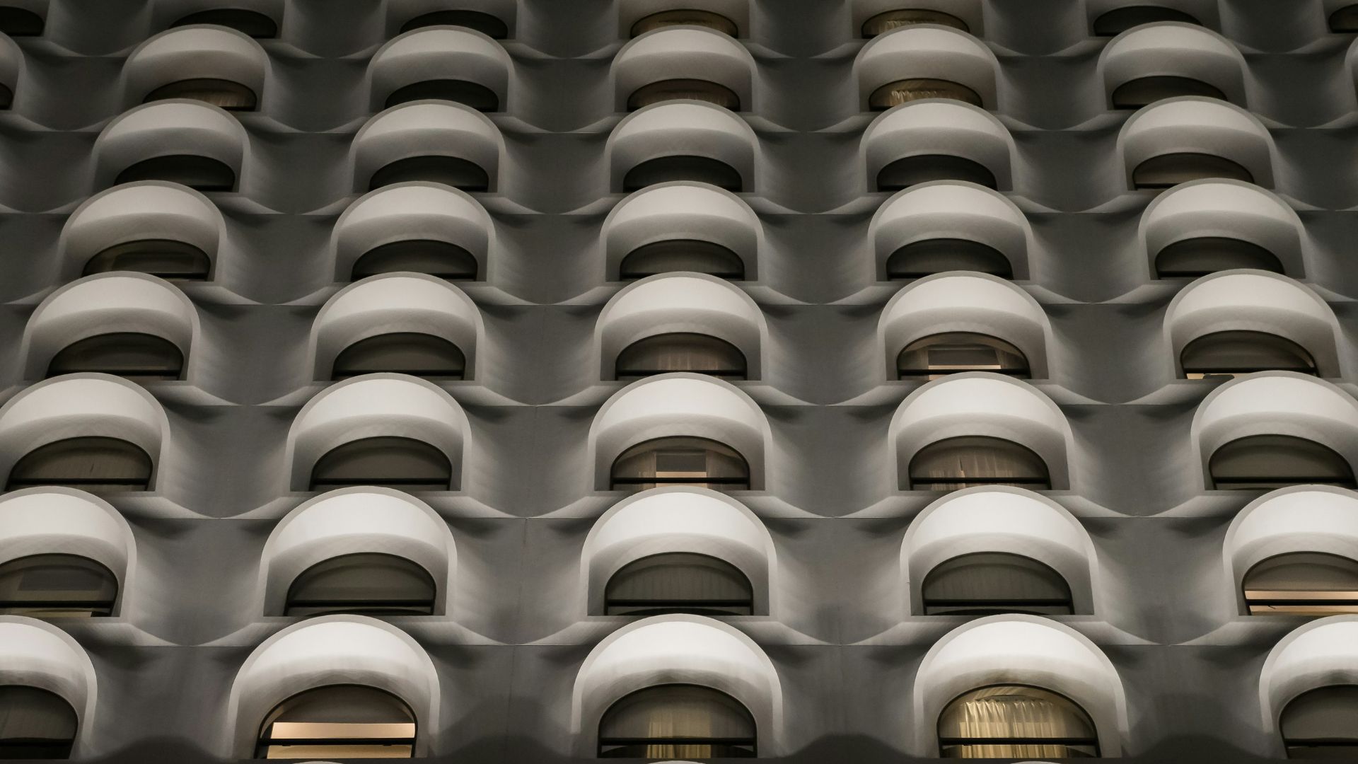 low-angle photo of white high rise building