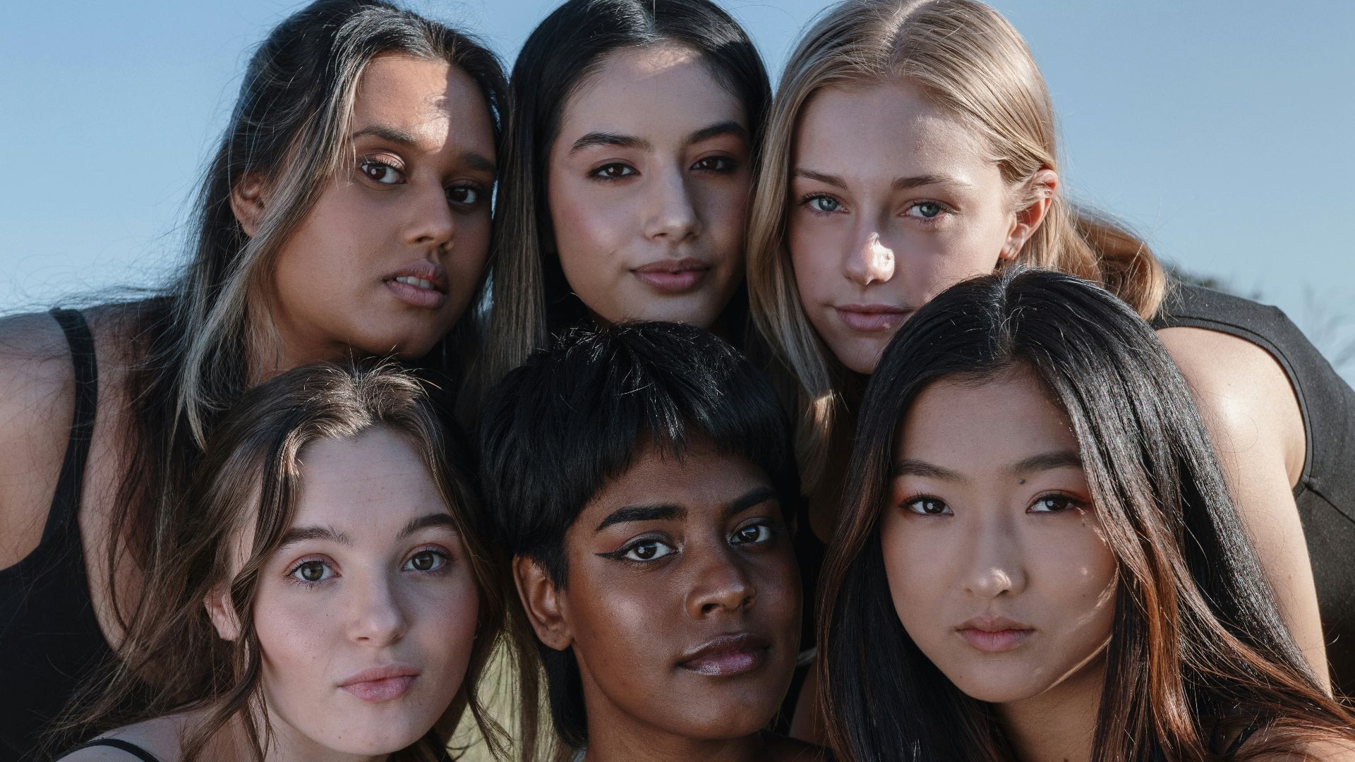 a group of young women posing for a picture