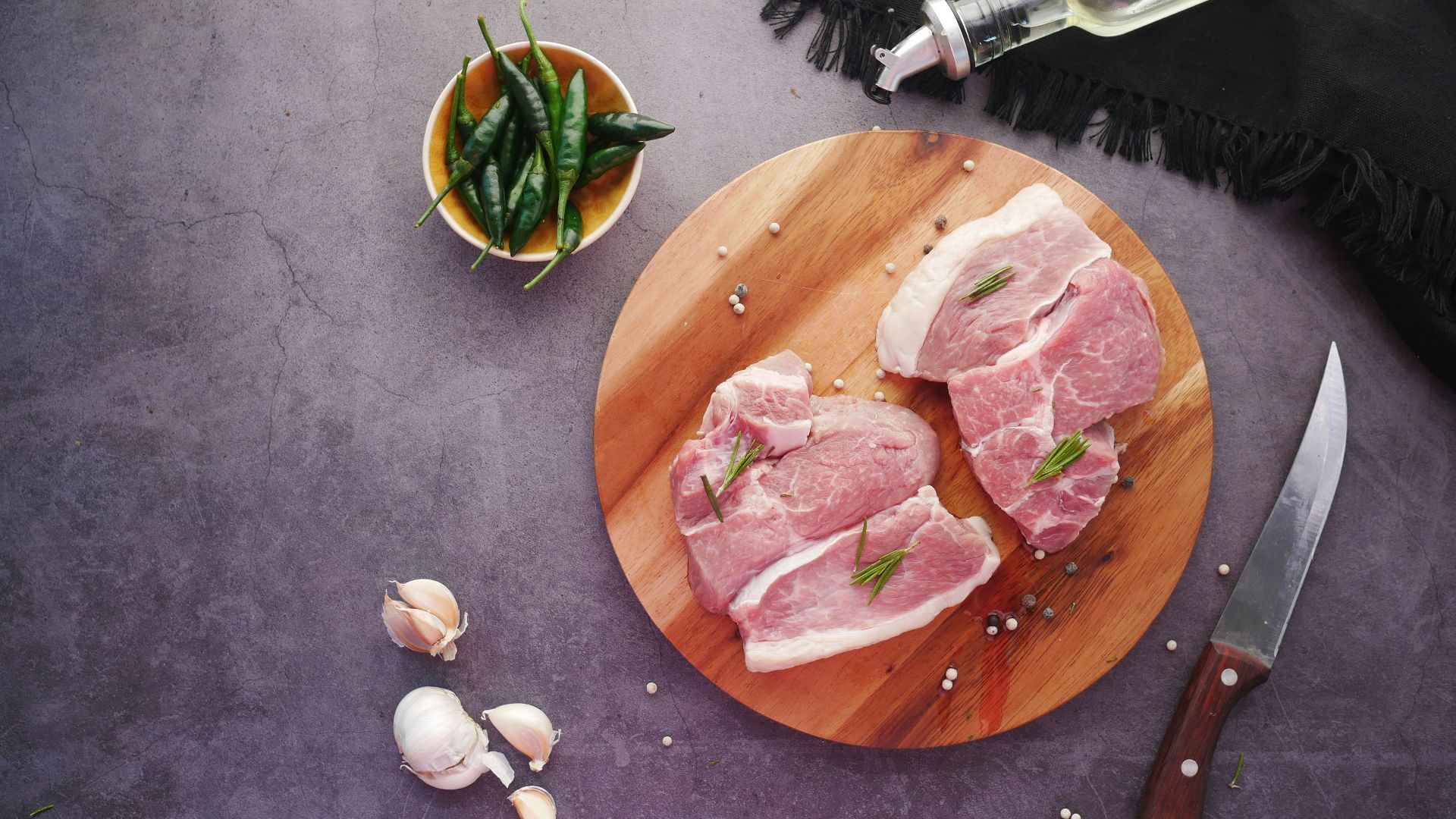 sliced meat on brown wooden chopping board