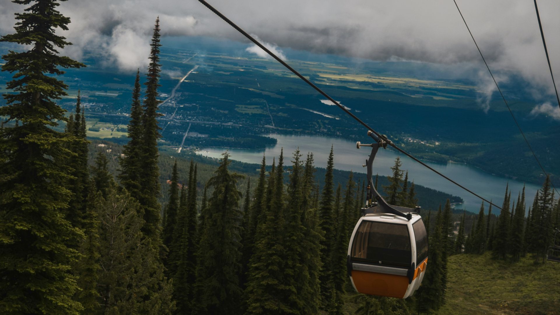 white and yellow cable car