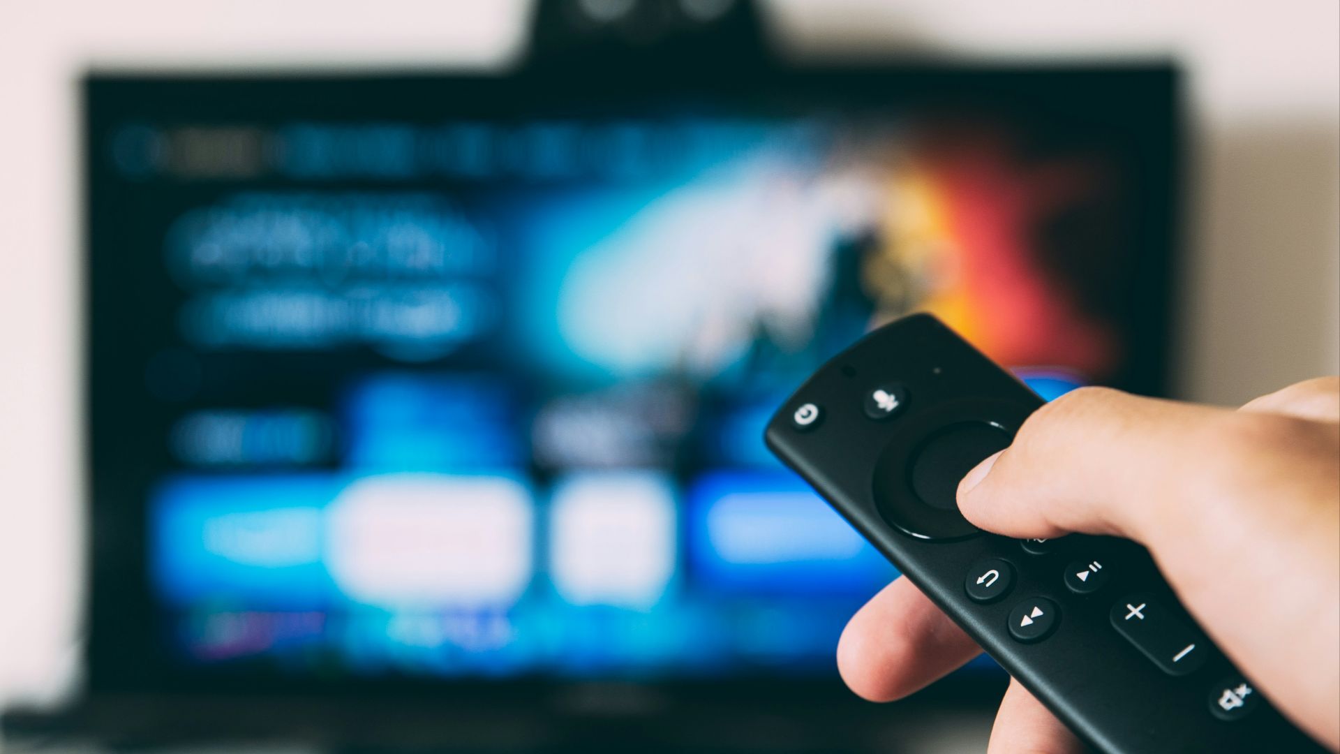 turned-on flat screen television