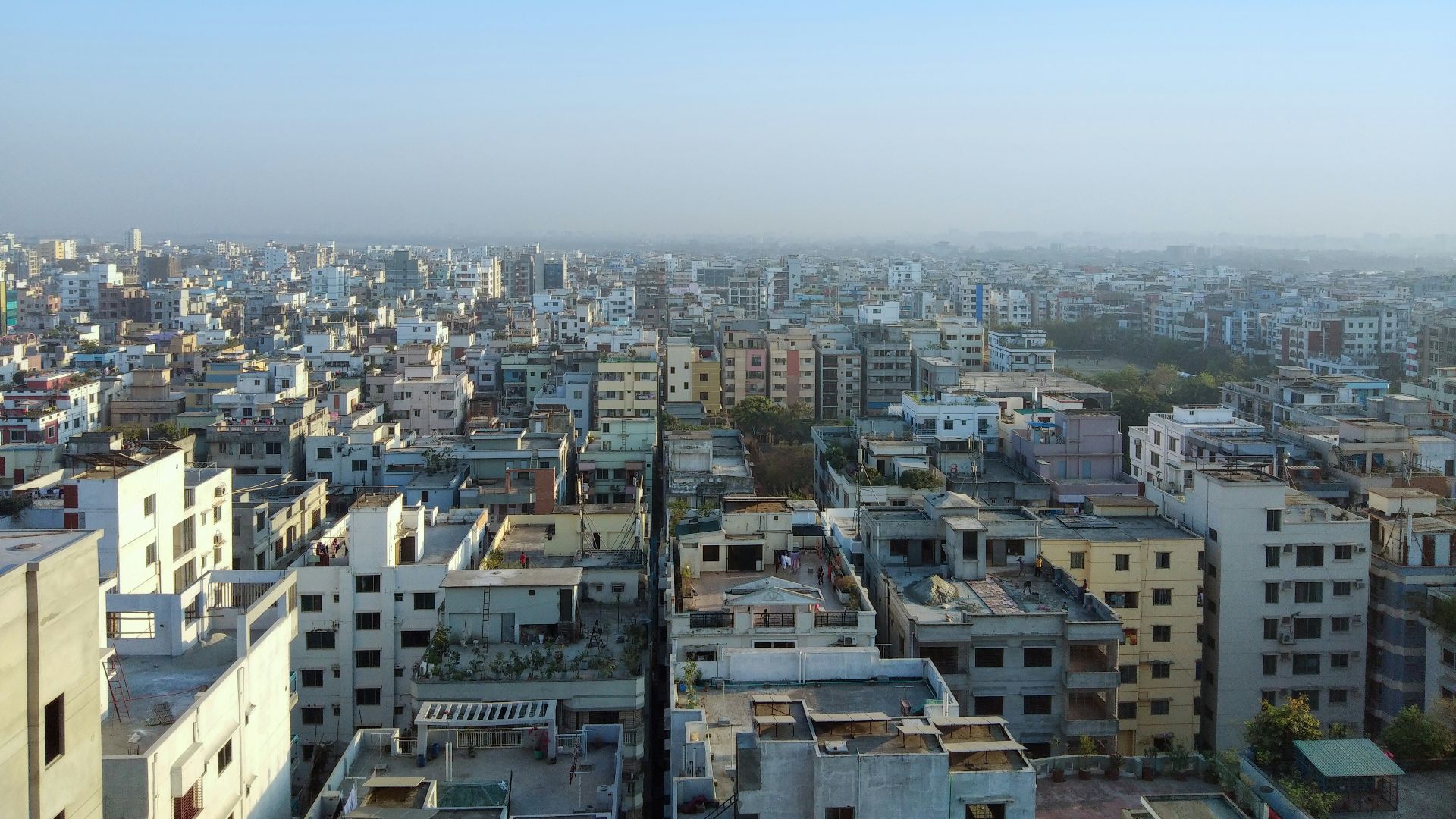 a view of a city from the top of a building