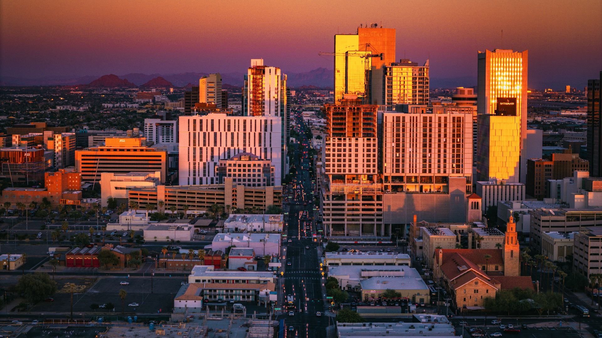 A view of a city with tall buildings