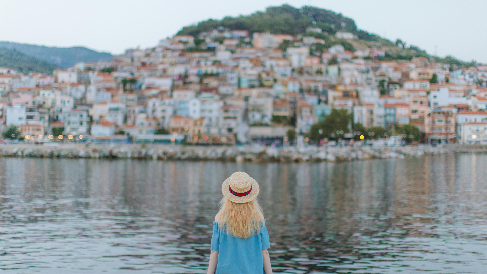 Lady-Looking-At-Villiage-Thumb-Rss