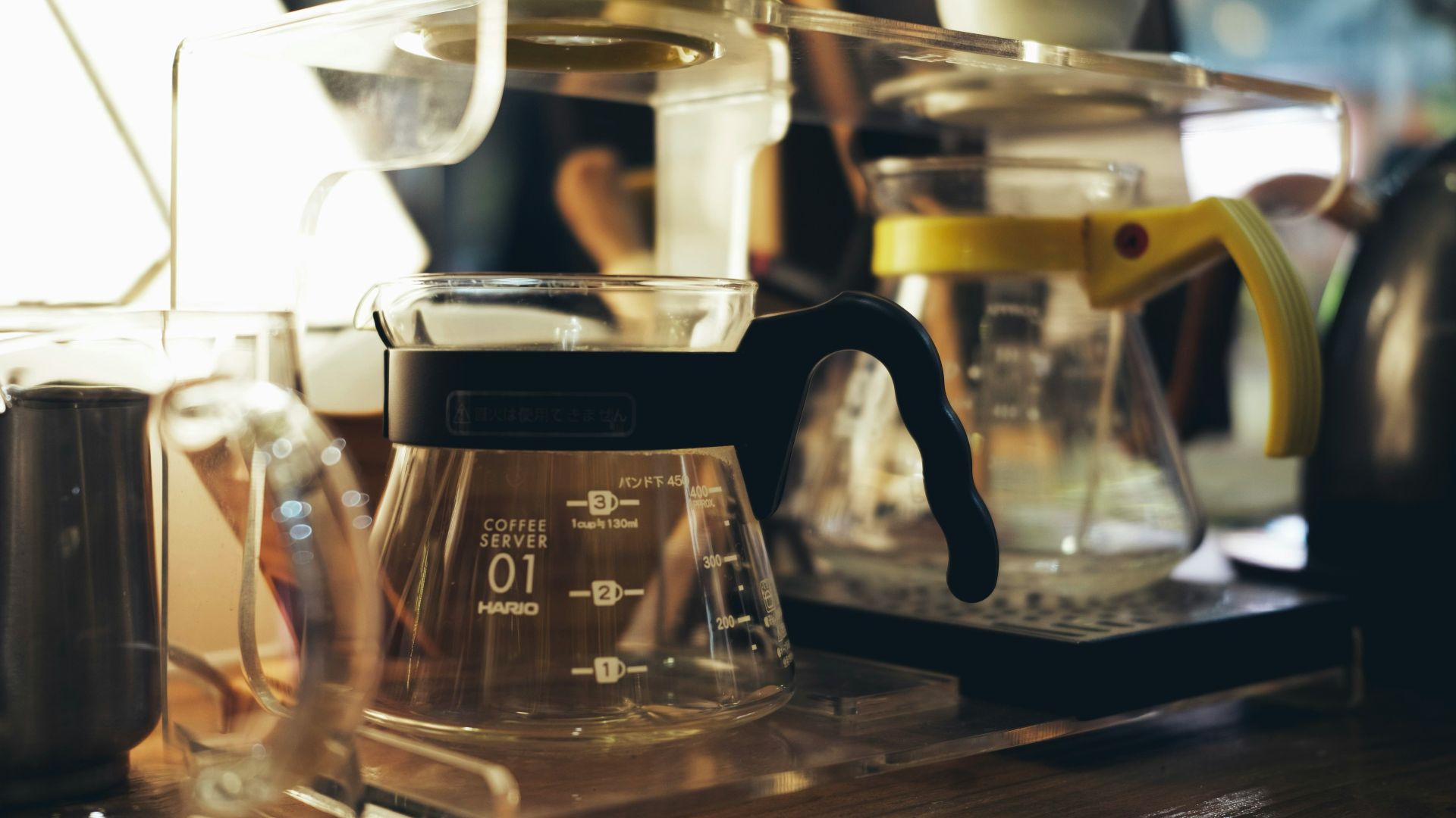 clear glass container on table