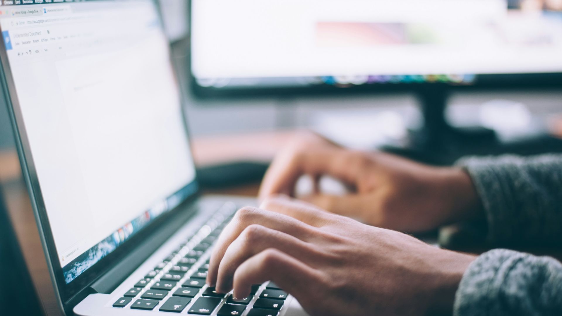 person using MacBook Pro