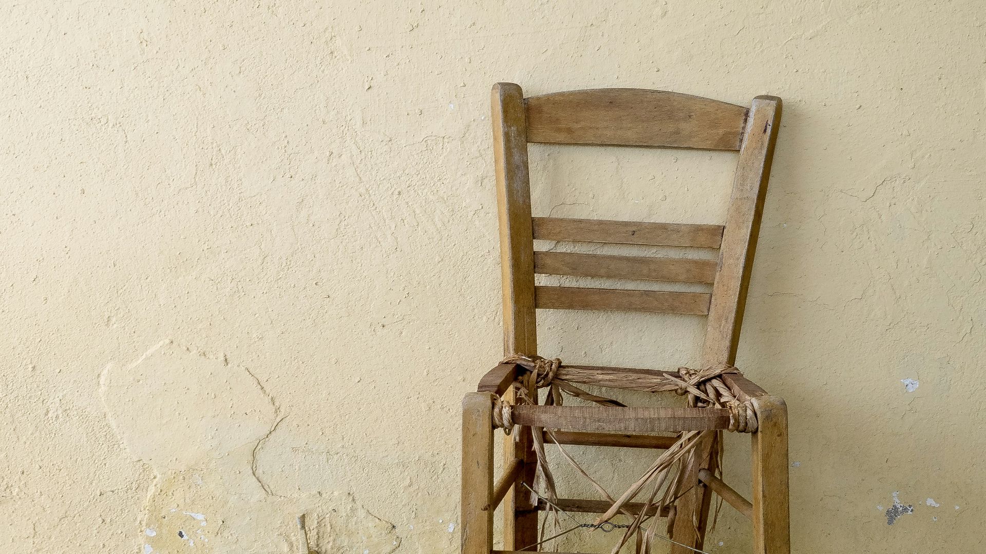 brown wooden ladder back chair
