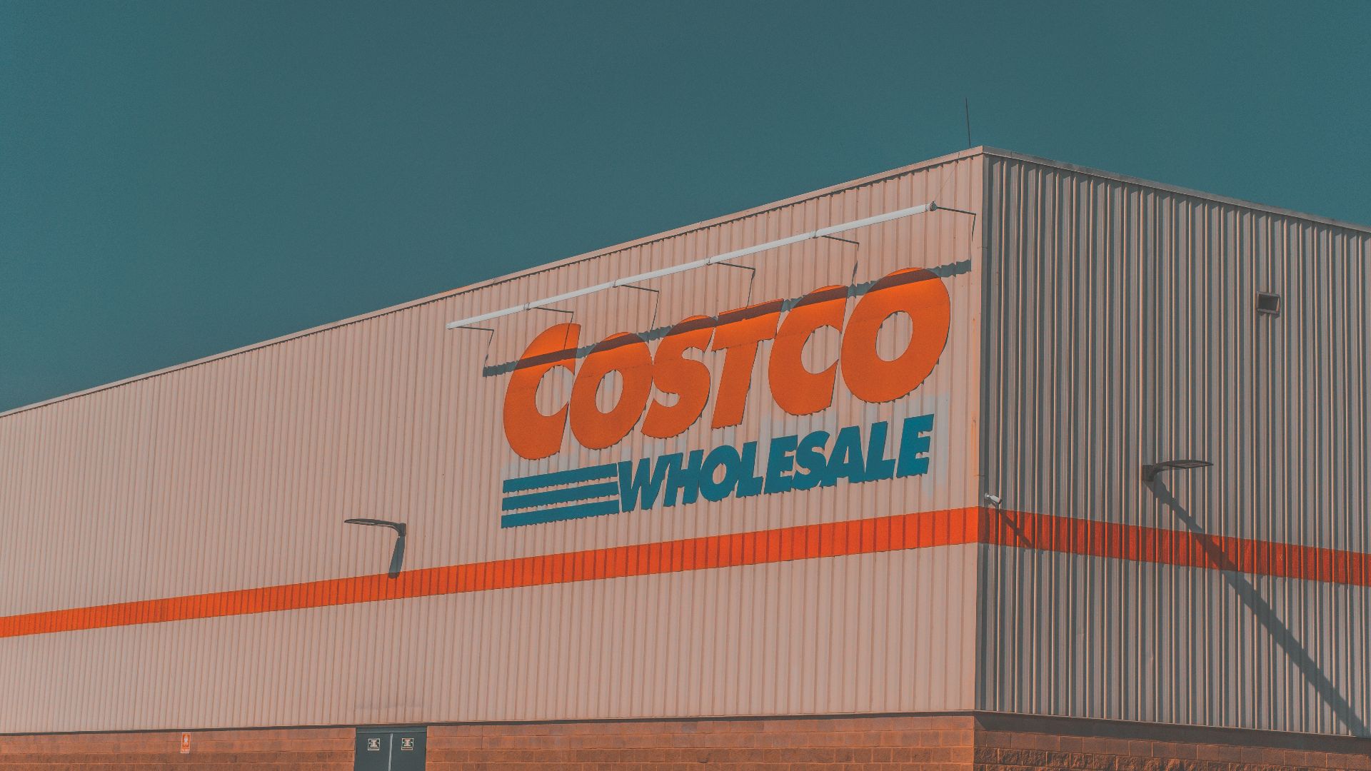 a building with a sign that says costco whole sale