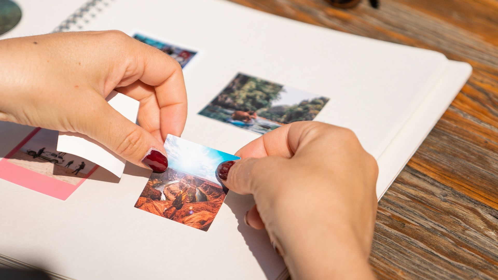 a person holding a toothbrush over a book