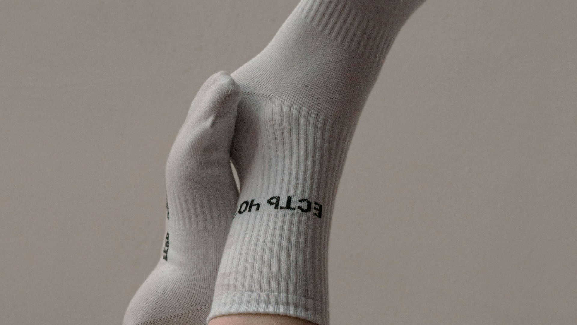 person wearing white nike sock