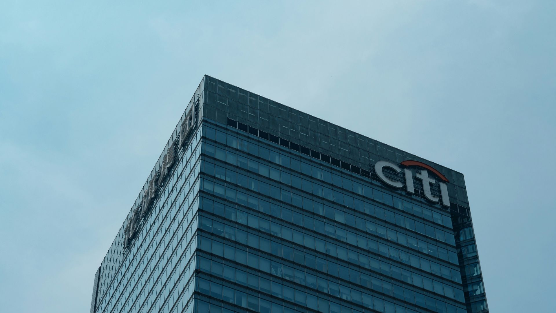 a tall building with a citi logo on it