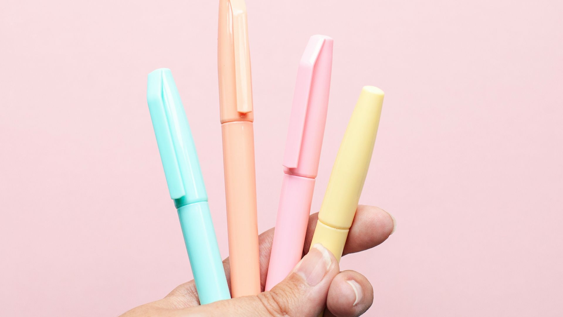 four assorted-color pens