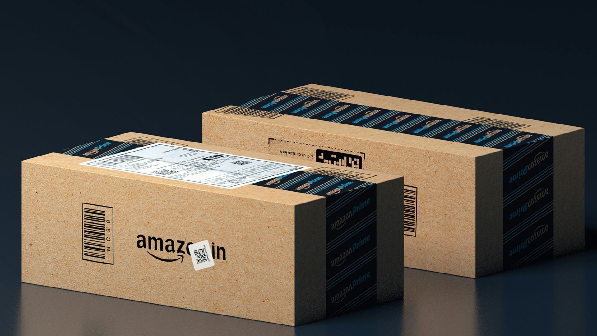 two boxes of amazon are stacked on top of each other
