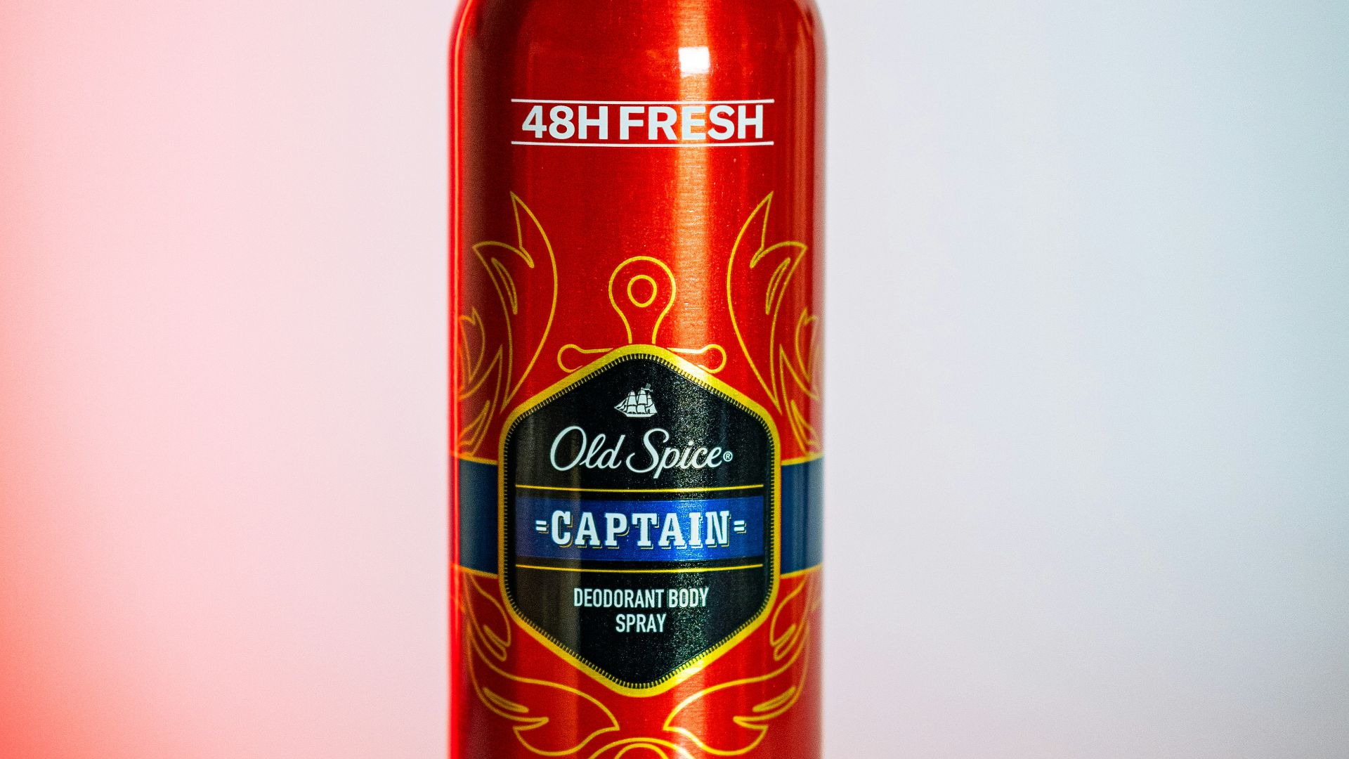 a bottle of red wine sitting on top of a table