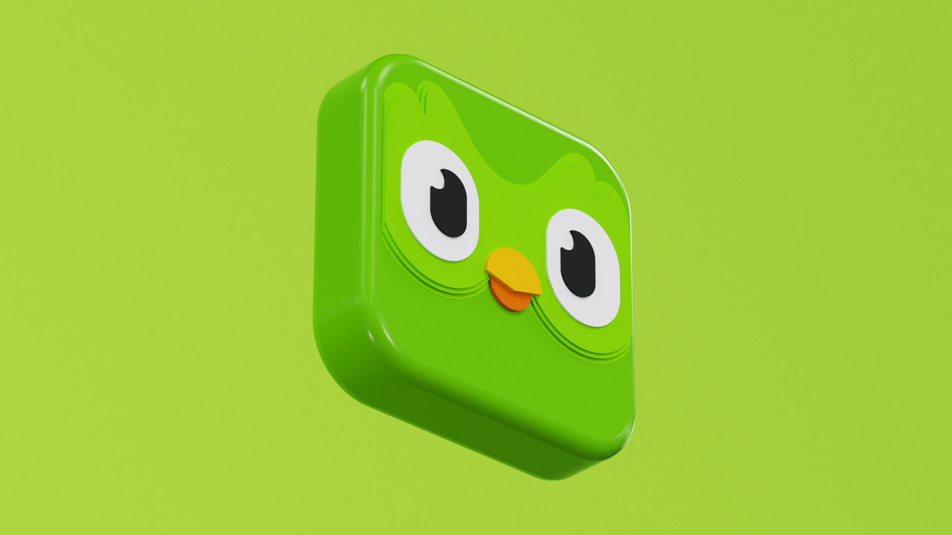 a green square object with eyes and a nose