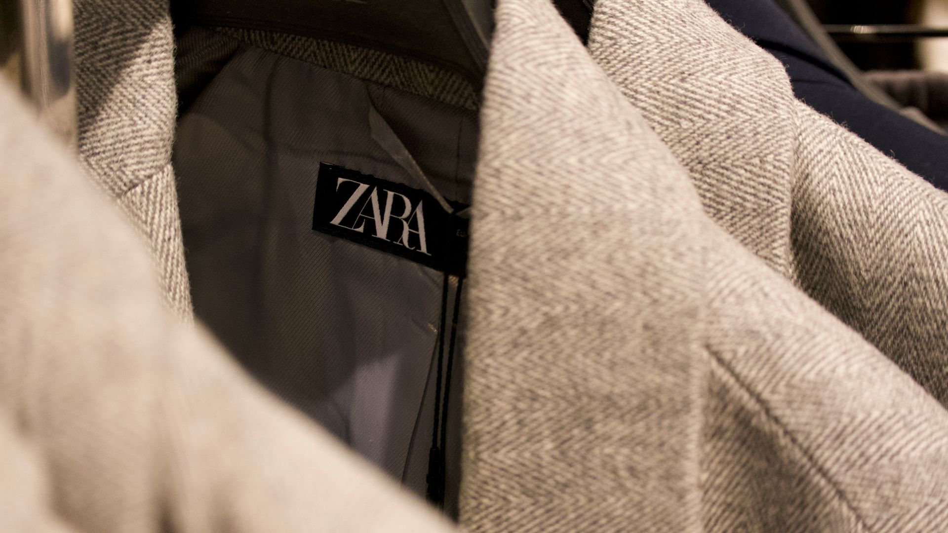 a close up of a jacket with a name tag on it