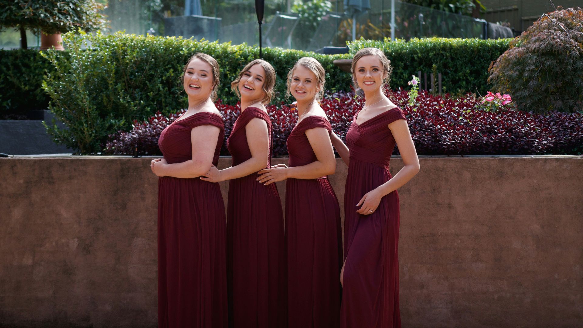 a group of women standing next to each other