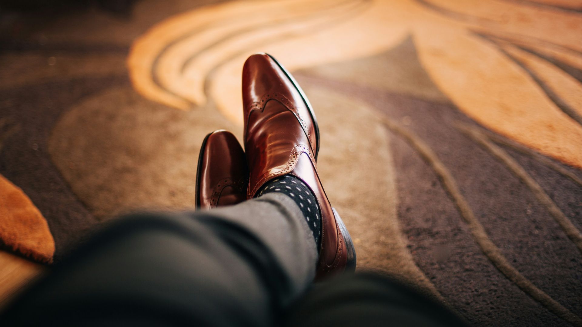pair of brown leather dress shoes
