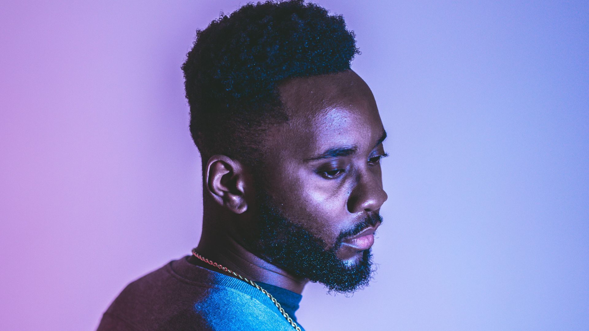 man in blue long sleeve shirt