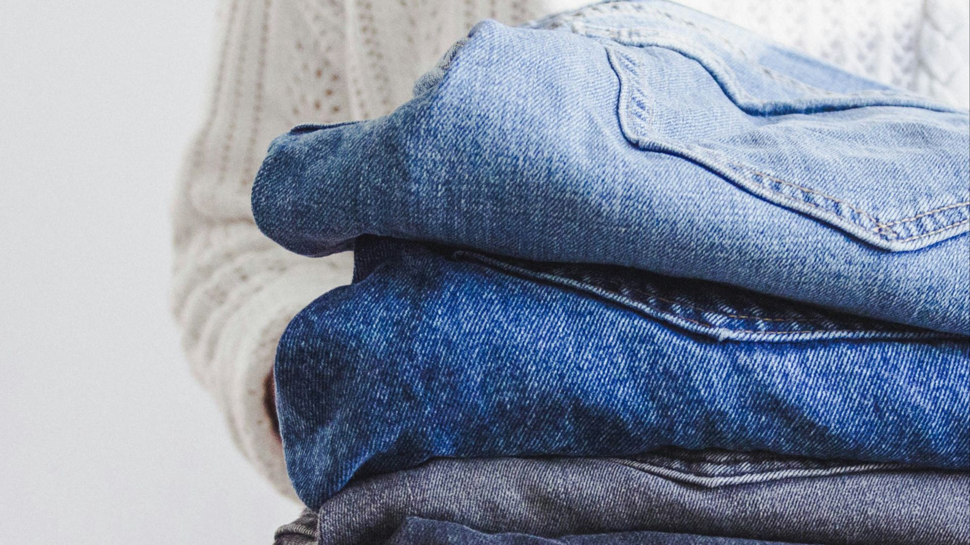 blue and white textile on white textile