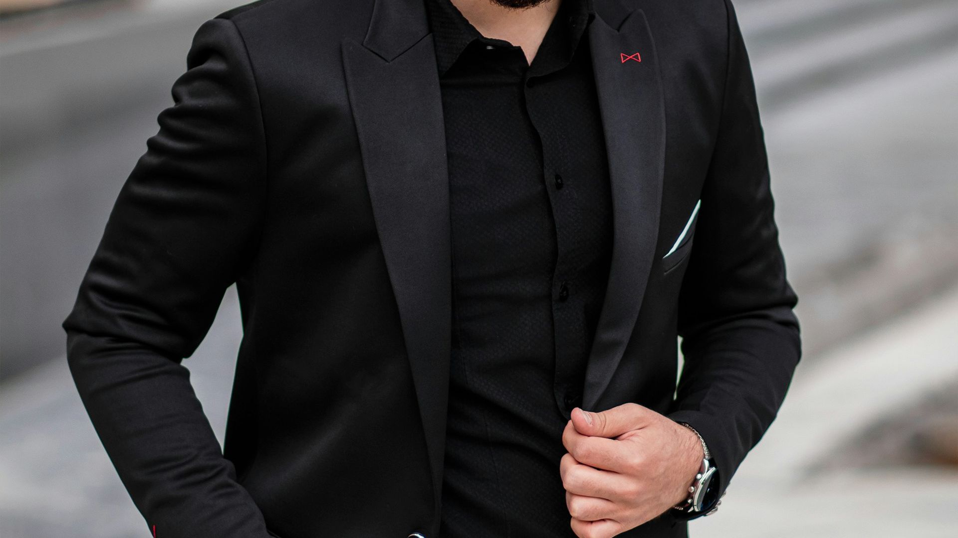man in black suit jacket and black sunglasses
