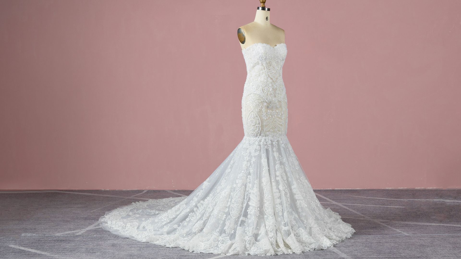 a white wedding dress on a mannequin