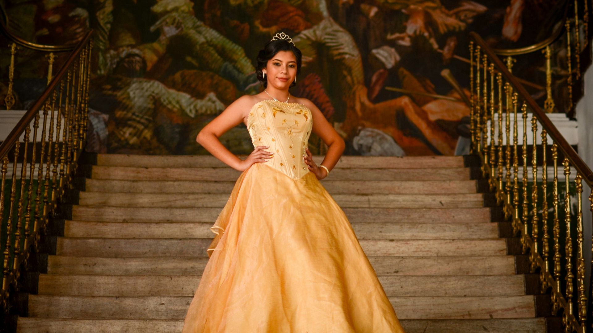 woman wearing brown dress standing on stair