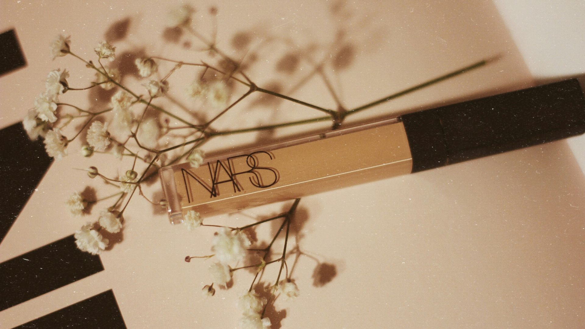 nude Nars cream bottle