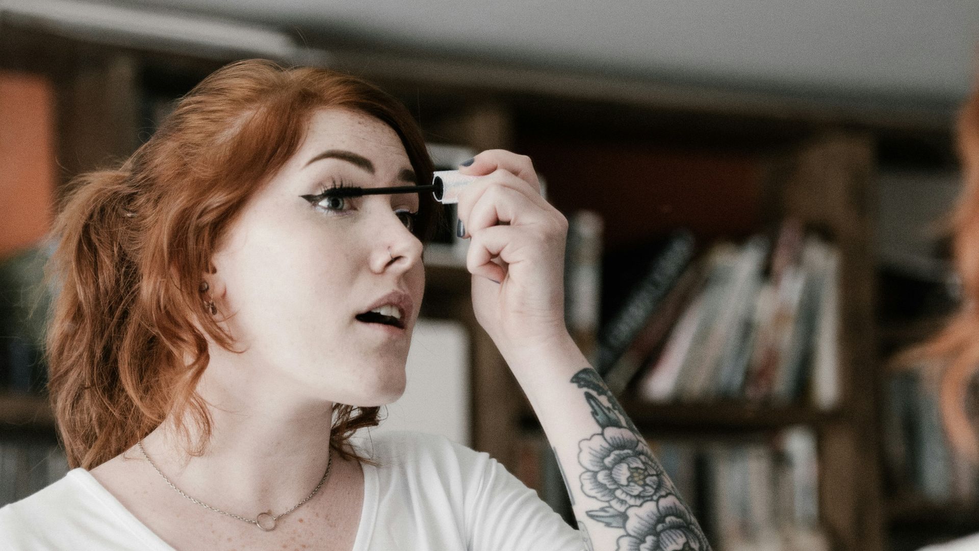 woman holding makeup rush