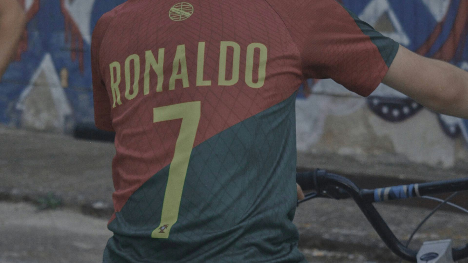 A couple of people that are on a bike